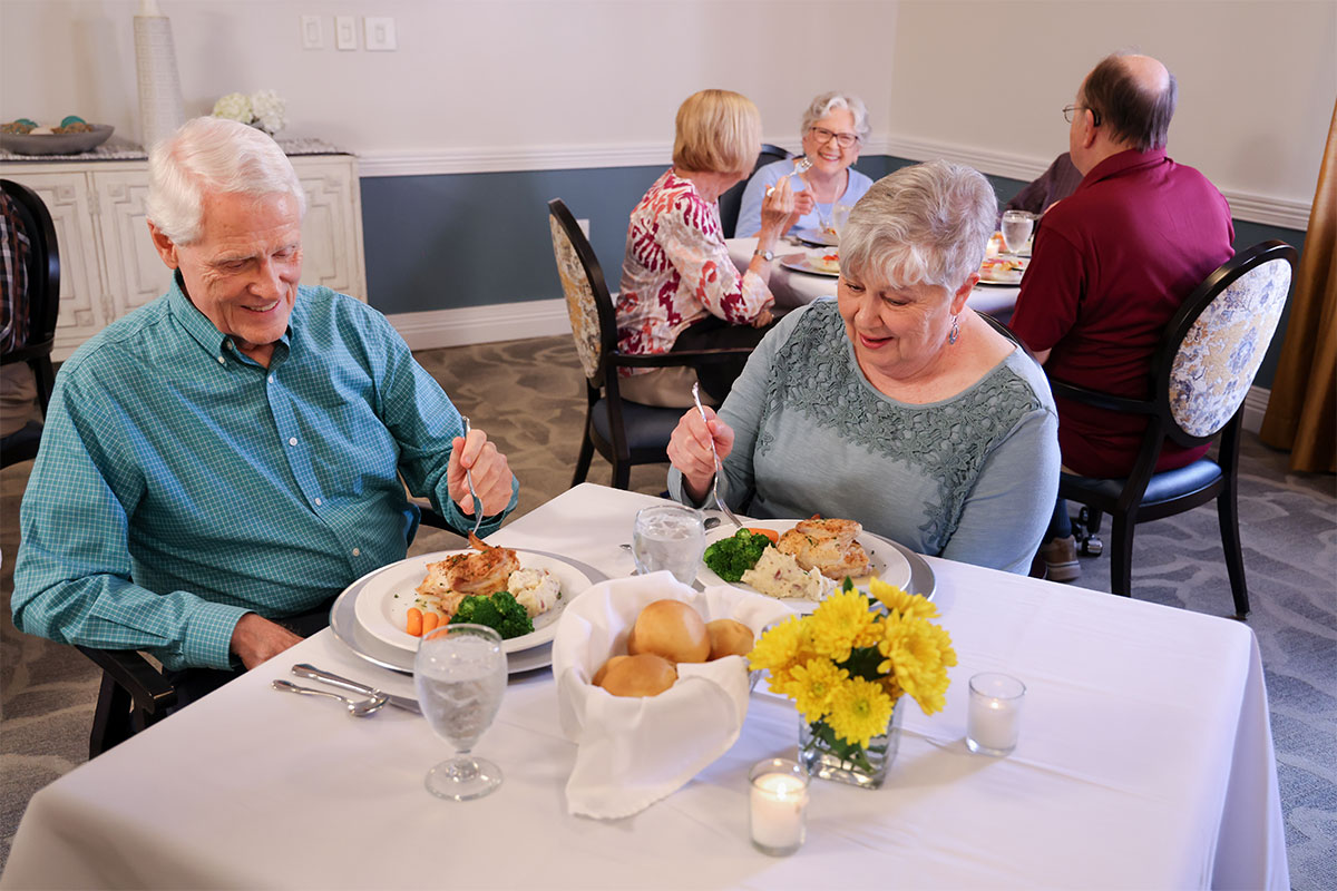 Older couple enjoying dinner at Westerwood.