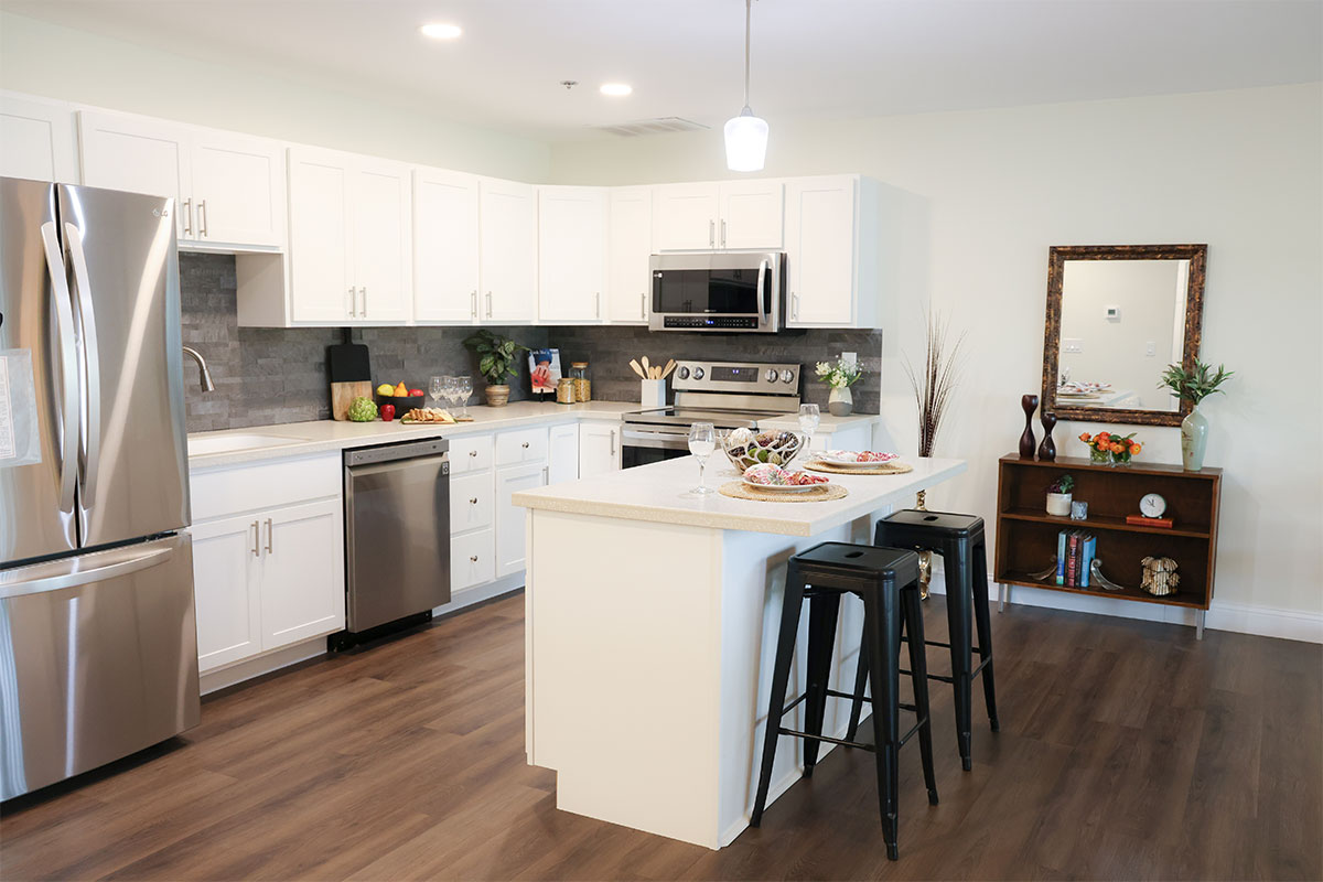 An open floor plan kitchen at a Westerwood apartment.