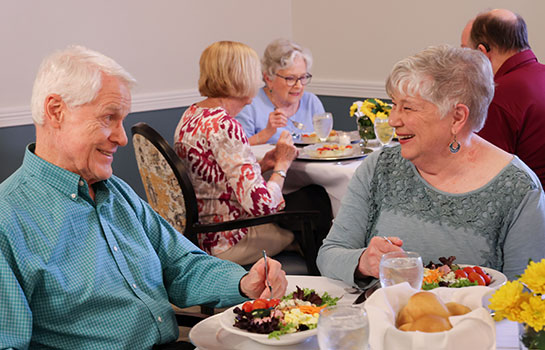 Older couple enjoying dinner at Westerwood.