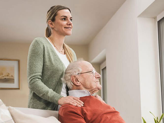 caregiver with senior man
