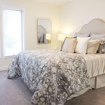 nicely decorated master bedroom