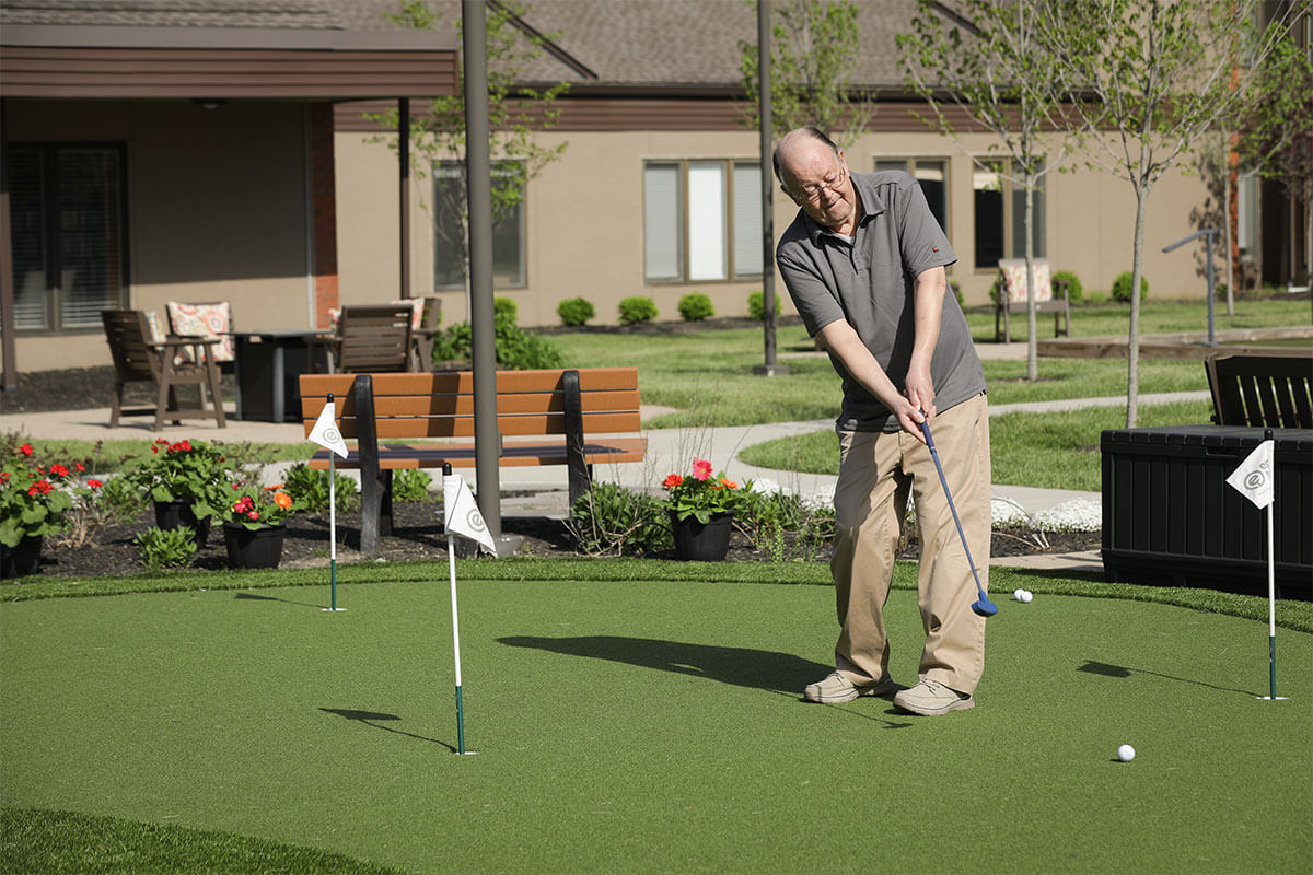 WW04292024-1825-1200x800-1 senior man playing mini golf